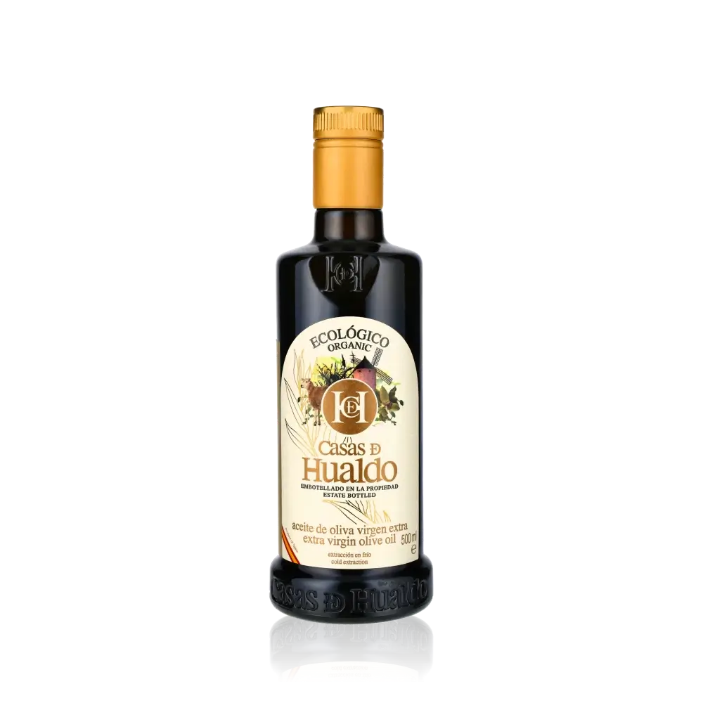 Casas de Hualdo Bio Olivenölflasche auf schwarzem Hintergrund.