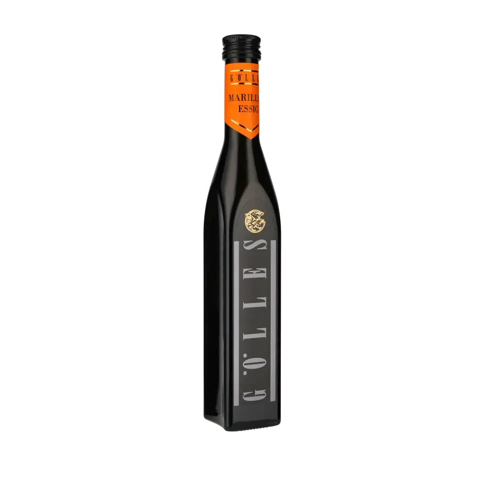 Gölles Marillenessig Flasche vor schwarzem Hintergrund.