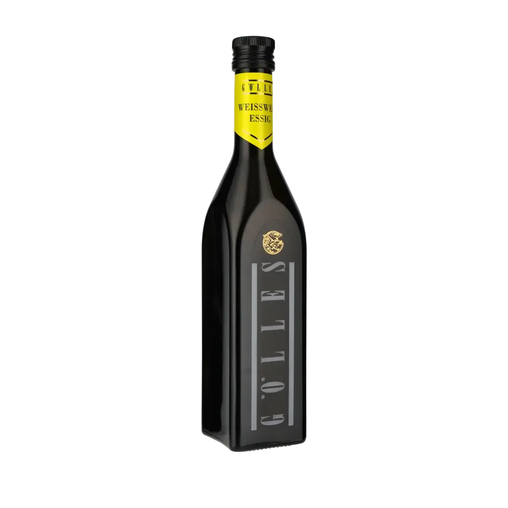 Gölles Weißweinessig Flasche auf schwarzem Hintergrund.