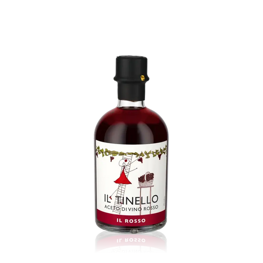 Il Tinello Il Rosso Weinessig Flasche vor schwarzem Hintergrund.