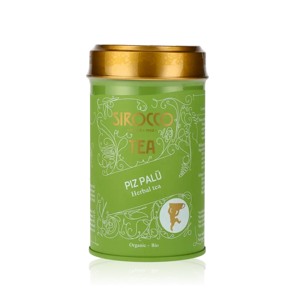 Grüne Teedose mit goldfarbenem Deckel.