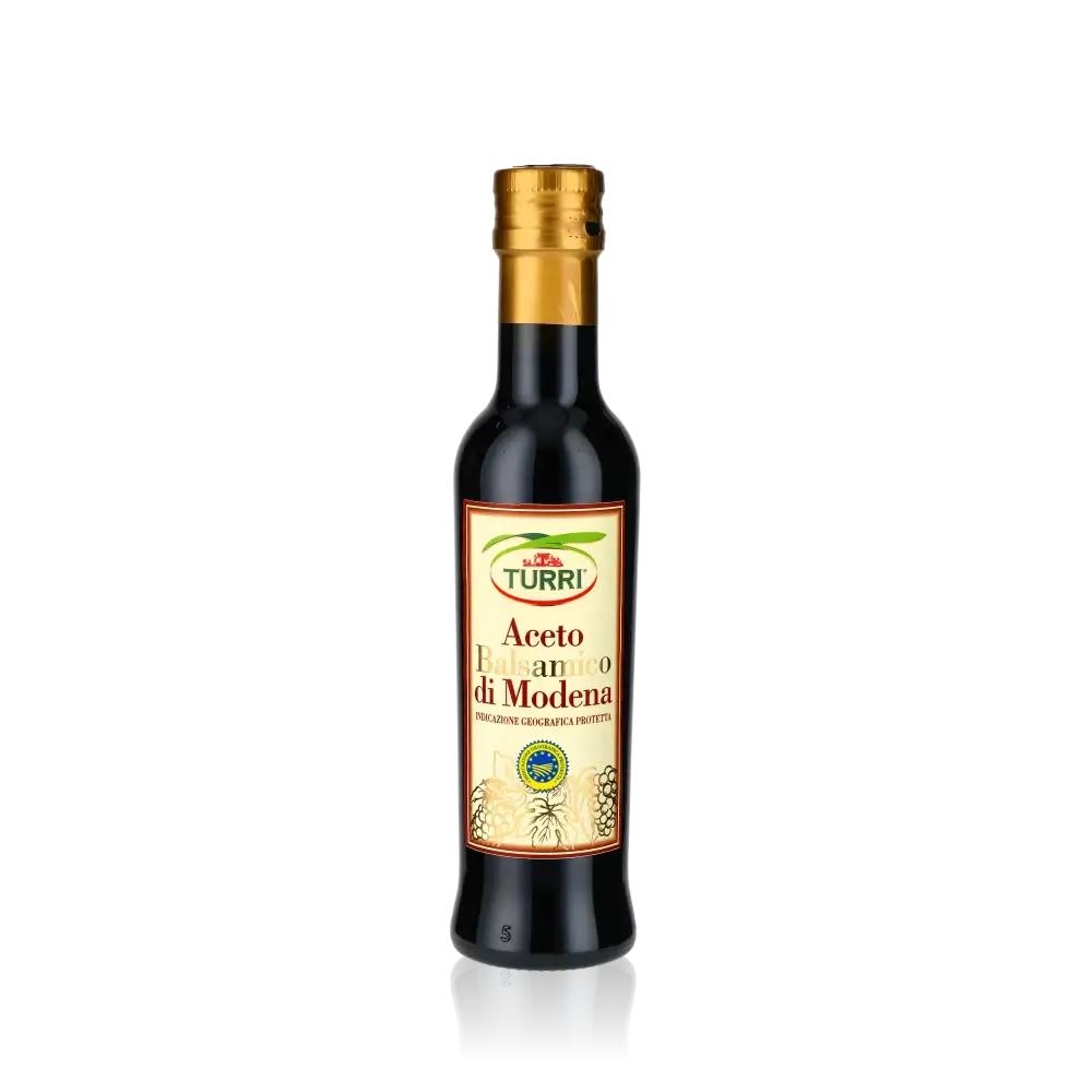 Turri Aceto Balsamico di Modena Flasche vor schwarzem Hintergrund.