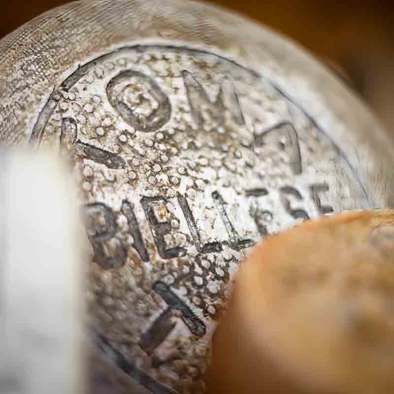Unklarer Text auf Flasche.